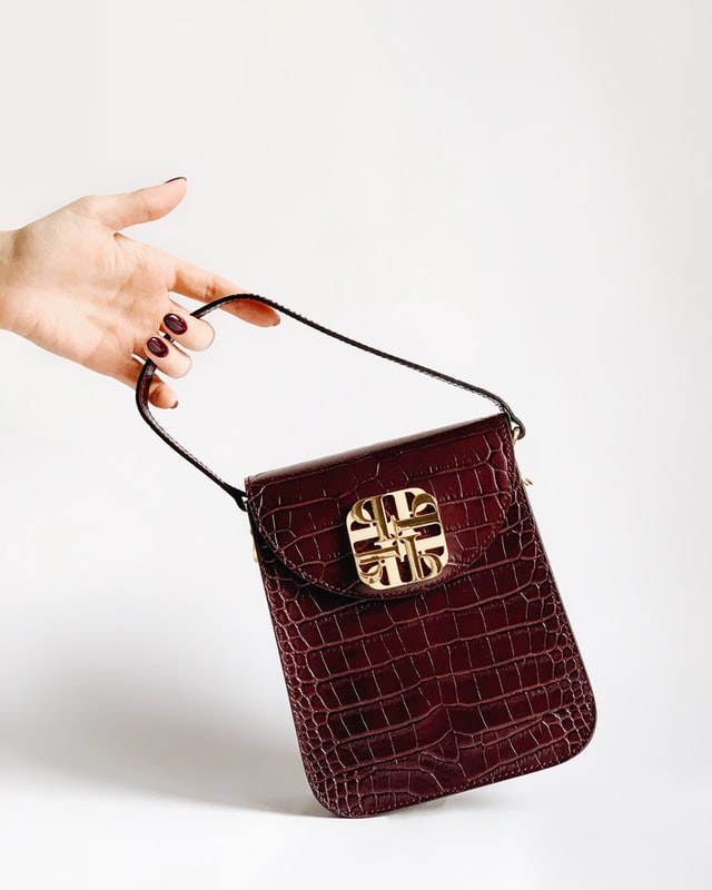 snakeskin brown handbag